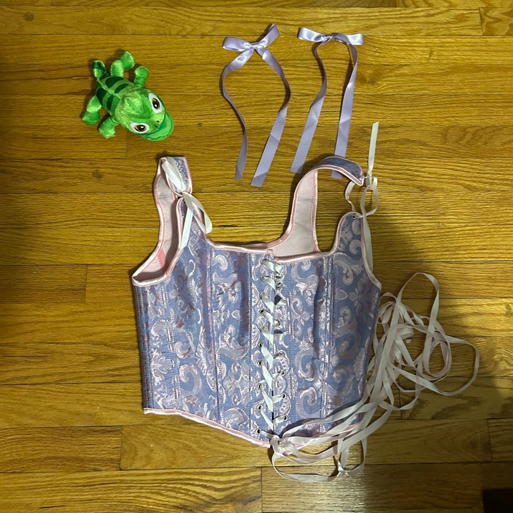 Rapunzel Corset, Pascal the chameleon and two purple bows and more